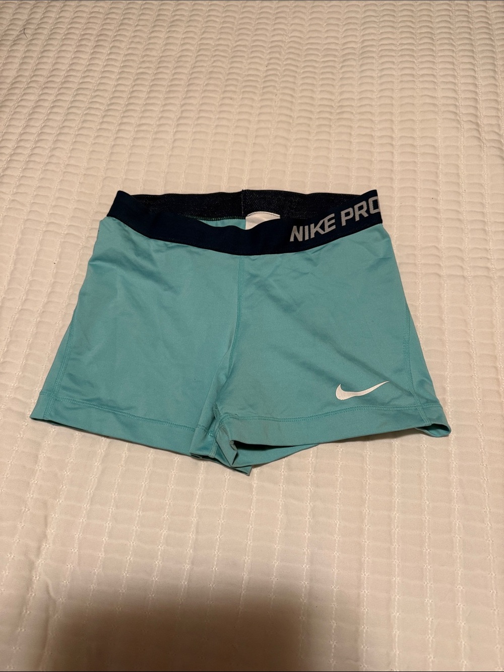 Nike Women's Teal Athletic Shorts with Navy Waistband